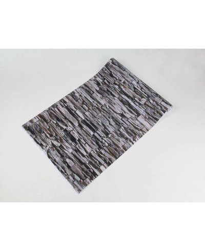 Papel de parede estilo pedra canjiquinha, com variados tons de cinza e detalhes na cor preta - Textura 37