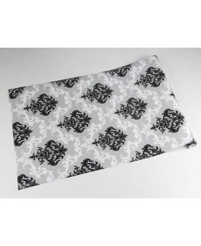 Papel de parede com fundo cinza e detalhes em branco e preto Papel de parede com fundo cinza e detalhes em branco e preto